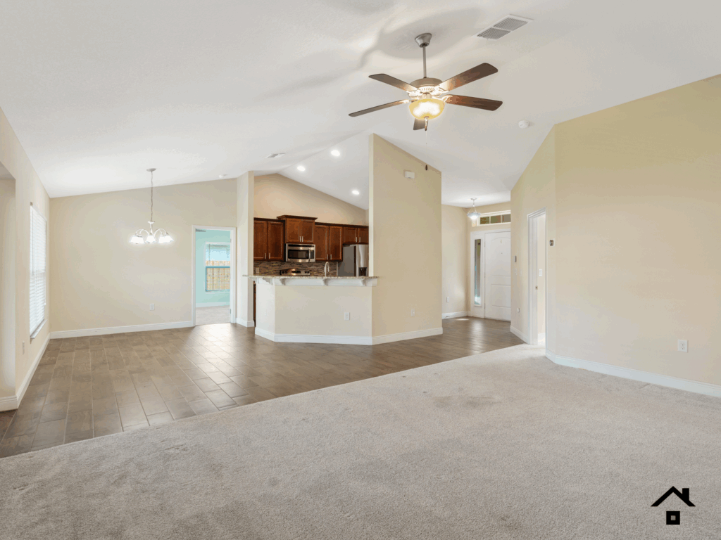 Out-of-state home seller - their vacant home living room in Port St Lucie