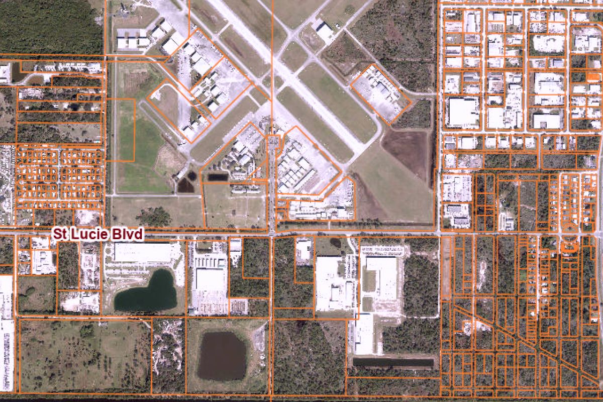 GIS aerial showing four separate inherited vacant land parcels in St. Lucie County Florida